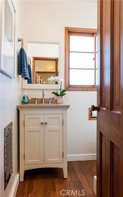 Bath with shower near kitchen