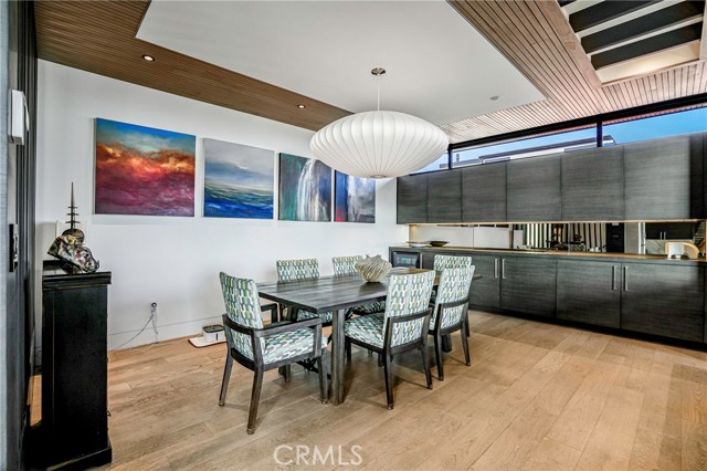 Dining room on 3rd level of home. Note built-in bar & beverage fridge. Lots of storage!