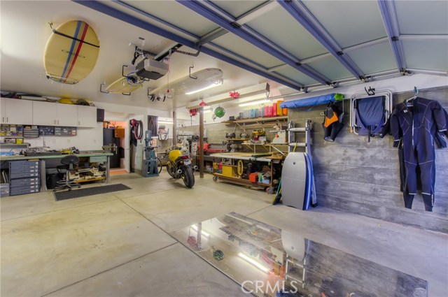 Very large 2 car garage with work shop.