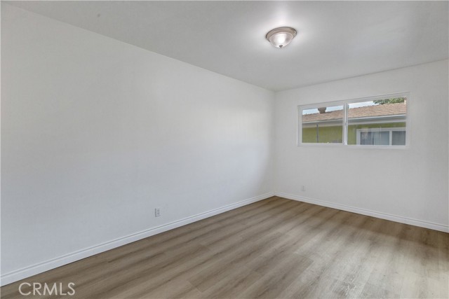 Bedroom 2. New Laminate Flooring / New Energy Efficient Dual Pane Windows.