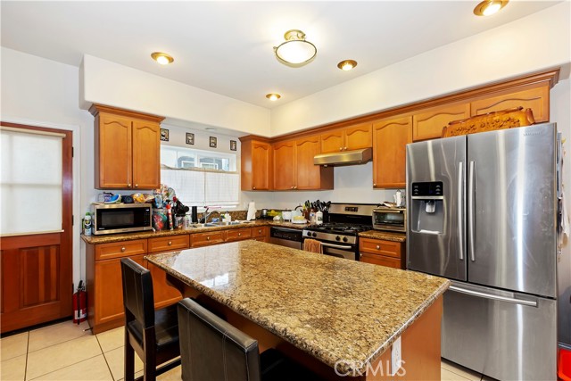 Kitchen island; side door, backyard access.