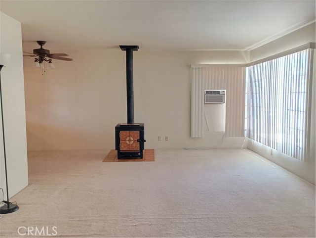 overlooking the living adjacent to dining area on the left side with built-in cabinet