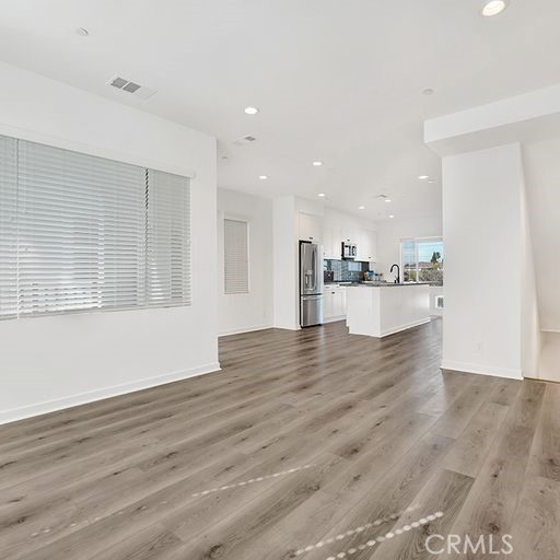 living area opens to kitchen