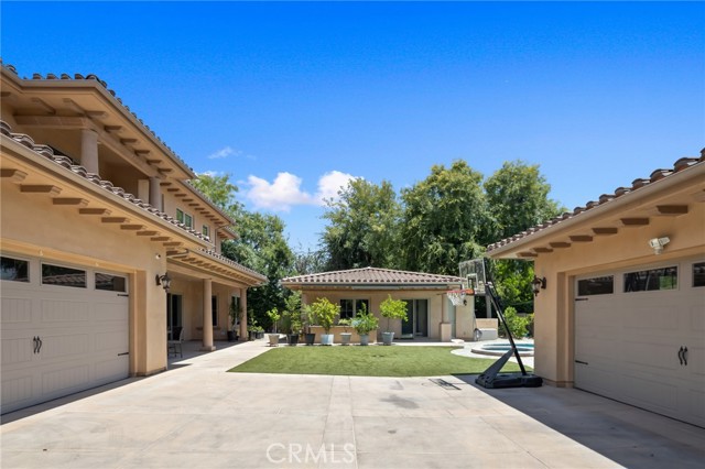 house, pool house, and detached garage