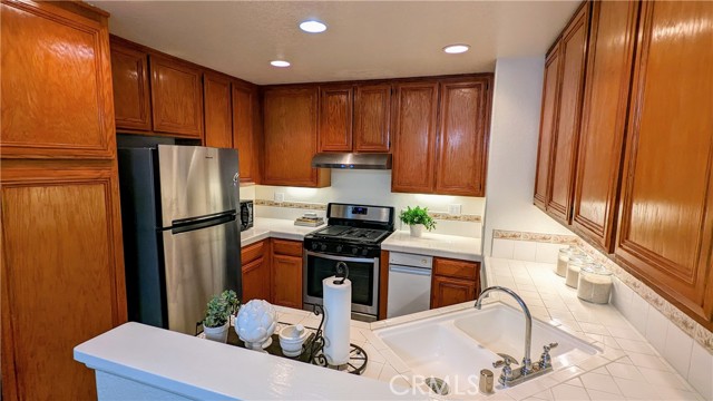 Kitchen with ample cabinets and newer appliances