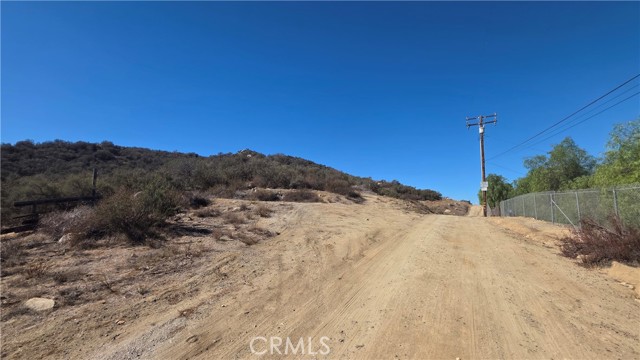 Wickerd Road with property and trail up to your left