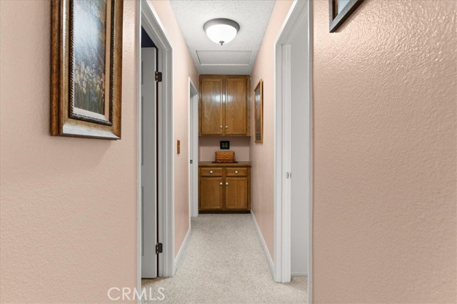 hallway towards the 3 bedrooms