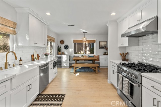 Kitchen: High Ceilings, Recessed Lighting and Open to Dining Room.