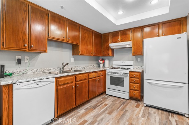 Updated Kitchen with Freshly Varnished Wood Cabinets