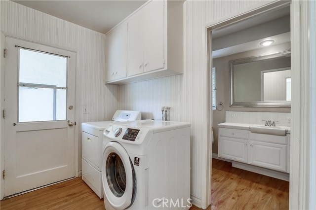 Laundry room plus door to garage through breezeway