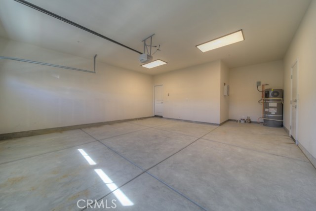 Spray foam insulation throughout attic, including garage. Efficient heat pump water heaters