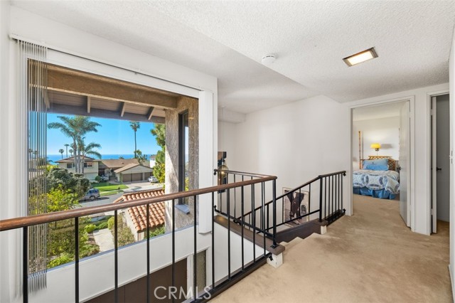 Second floor with view of ocean over roof tops