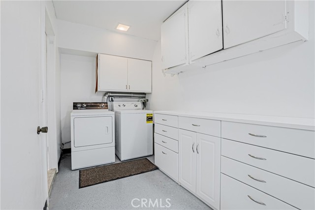 Laundry area next to garage