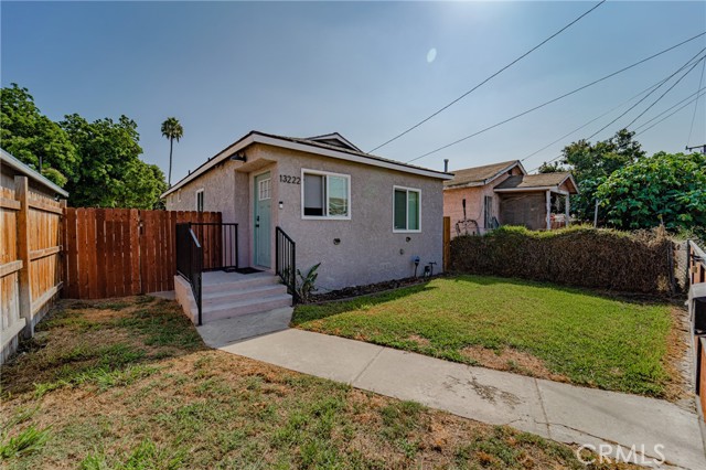 13222 S Largo Avenue Compton, California *** REMODELED HOME *** Welcome to this beautiful THREE bedroom TWO bath home in the City of Compton. This jewel has been very well maintained. It consists of a white open kitchen with quartz counter tops and white cabinets. A large open living room with a separate dining area. Laminate wood flooring with dual pane windows and ceiling fans through out the home. THREE spacious bedrooms for a growing family. Two very well maintained bathrooms. A laundry area where you can double stack washer and dryer. A large back yard that is perfect for entertaining family and friends, and a driveway for parking. A private front yard with its own fence. This home is centrally located to major freeways. It's a MUST see! Come and take a look...