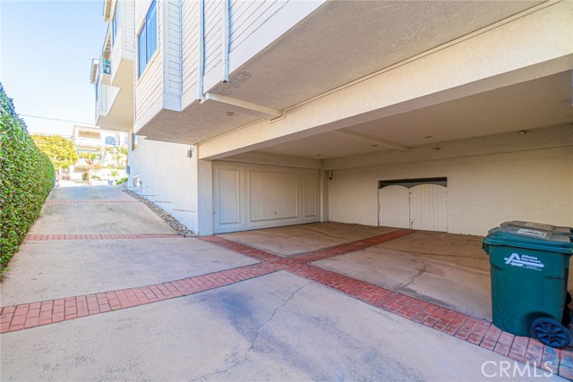 Driveway down to the over sized two car garage