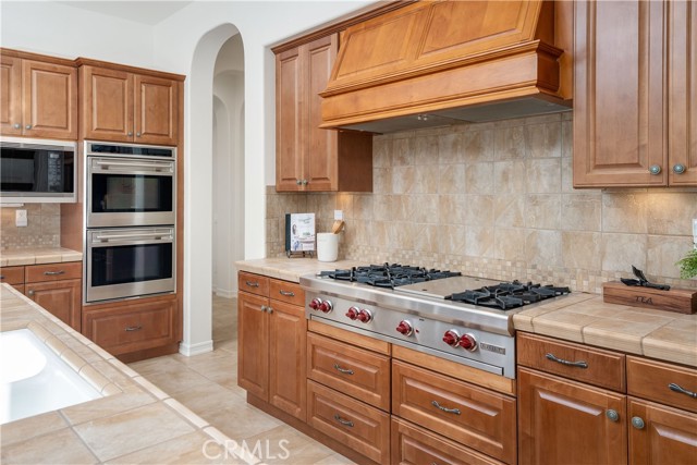 Kitchen with 6 burner Wolf Stove