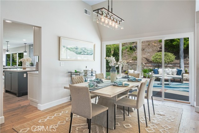 Dining room flows to kitchen.