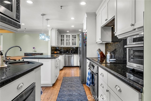 Ample kitchen with stainless steel appliances