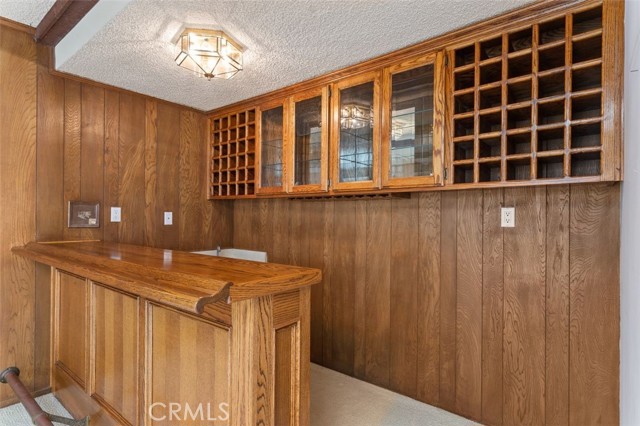 Family room wet bar is great for entertaining.