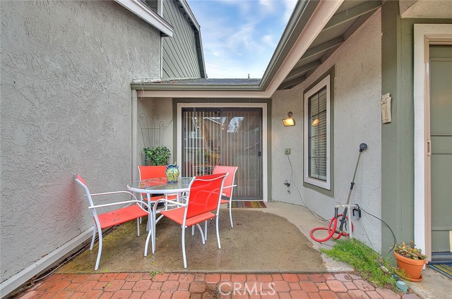 Sliding door leads to patio area