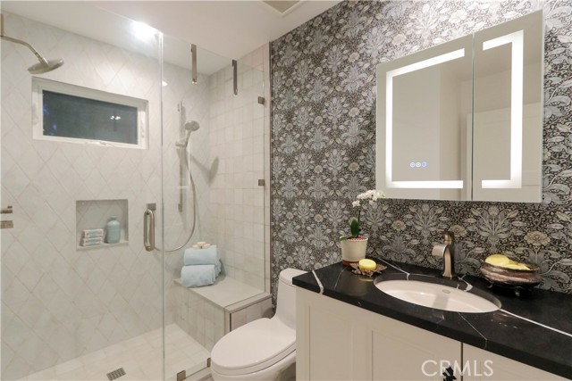 The entry level ensuite bathroom is tastefully appointed offering spa inspired ambience with elegant fixtures, designer tile work and a sophisticated blend of warmth and functionality.