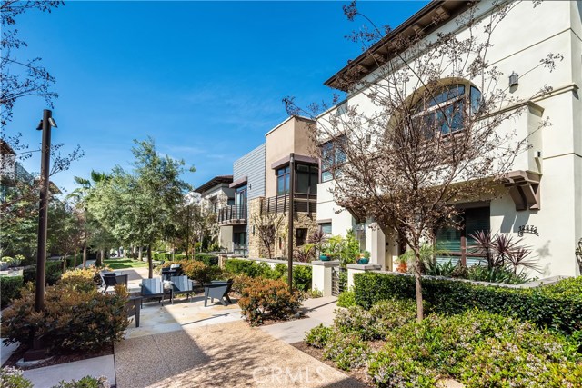 12872 Hammock Lane Playa Vista, California One of only 22 Trevion homes, this plan 3 model is a rare gem. This walk street facing home offers a spacious & open floor plan ideal for indoor/outdoor living. Unwind in the immense great room which flows graciously through sliding glass doors to a tranquil courtyard boasting Moroccan tile and stylish fireplace. Channel your inner chef in the stunning gourmet kitchen equipped Quartzite countertops, expansive eat-in island, Sub-Zero & Wolf appliances, chic white cabinetry, & separate area for coffee bar. The luxurious master suite mimics a five-star hotel with a balcony, dual water closets, his & her vanities, marble shower, soaking tub, extensive built-ins & walk-in closet. Bonus bedrooms w/plush carpeting, large closets & thoughtfully designed en-suite bathrooms. Additional features include laundry room, front patio, hardwood floors & third level bonus space w/en-suite bath ideal for a guest suite, office, or playroom. In the heart of a classic coastal neighborhood, this location is a nucleus for family and friends. The community amenities that are offered are the reason you come to Playa Vista that include pool, spa, and gym. Walk to all the shopping, WholeFoods, and theaters. Relaxed but refined, crisp but inviting, the casual elegance of this purposeful environment embraces an active lifestyle where sun, family, and memories are closely interwoven.