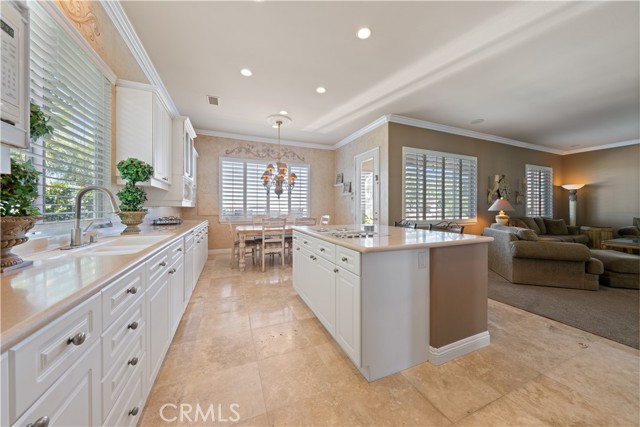 Spacious kitchen with lots of counter space, island and plenty of cabinets.