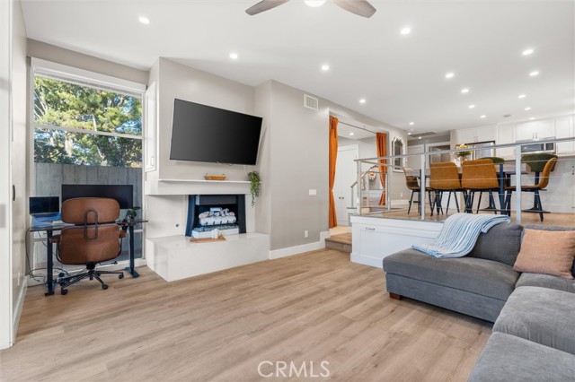 Prime Workspace and Corner Fireplace in Living Room