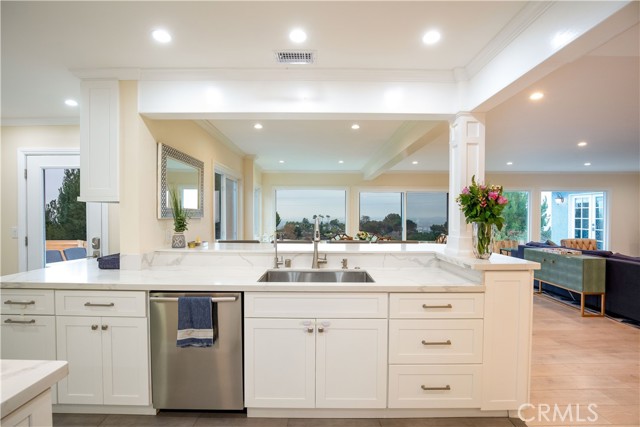 Great use of space in the kitchen with a bar countertop for seating