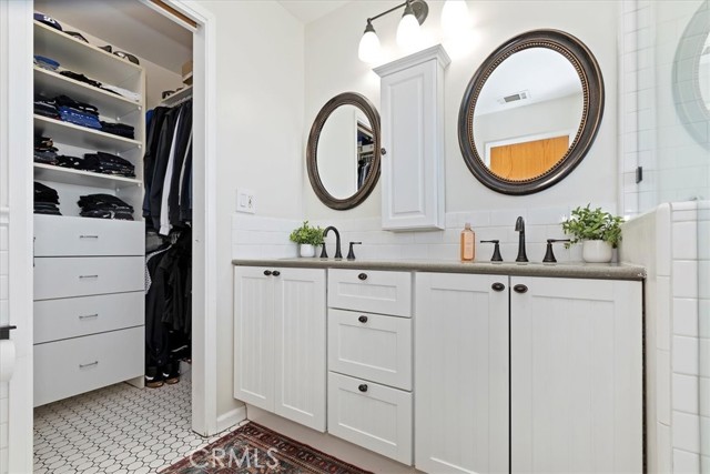 Primary bathroom with view to primary closet