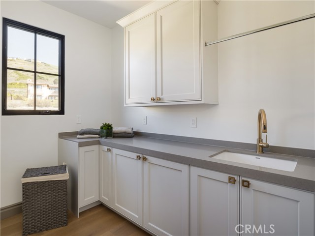 Upstairs laundry room.