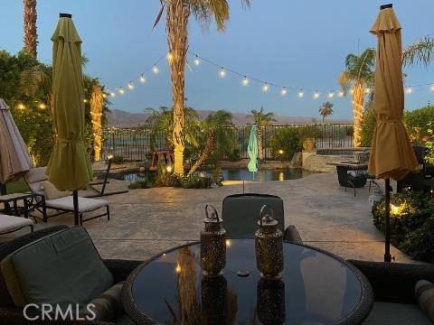 42816 Dell Lago Court Indio, California MOTIVATED SELLER!!! Beautiful tropical resort, 3 bed, 2 bath home. Gorgeous pebble tech salt water pool, extra deep spa with custom stone spillway. Great views of Terra Lago golf course and lake with mountains as back drop. Ample backyard seating areas with propane fire table, outdoor TV and ceiling fan. There is a 3 car tandem garage with dedicated A/C. 3rd car could easily be converted to a 4th bedroom. Community has a Golf Course, Clubhouse, Lap Pool & Kids Pool with change rooms and showers, Community Spa, pool table, patio area overlooking the 3 acre lake. Home has been converted to a city approved Short Term Rental (STR). Neighbor homes are STR and produce approx. $10-20K/month income. One of the best STR neighborhoods in the valley. Completely TURN KEY! ********