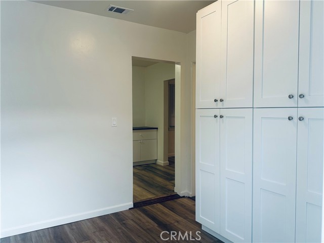 Bedroom with cabinetry