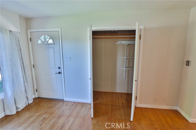 Walk in the living room and you will not even know there is a nice large closet here, until you open it!