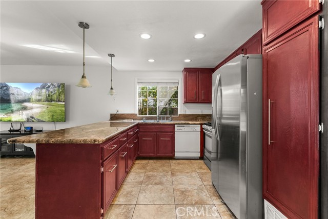 Kitchen open to family room and dining area