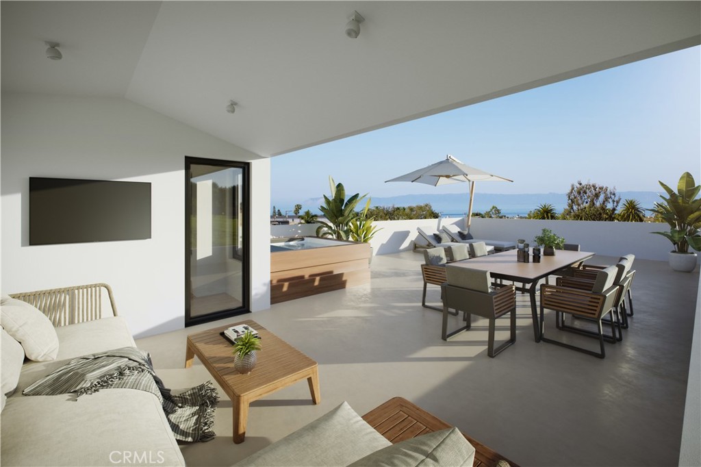 Sprawling partially covered, partially uncovered rooftop deck with 180-degree ocean, city and Pelican Hill views. This area is also engineered for a spa. All renderings are conceptual only. Subject to change.