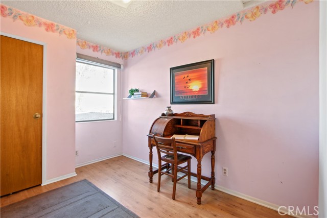 Bedroom 6 (currently shown as office) with large closet.