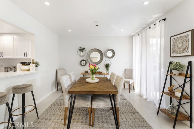 Dining room with large sliders leading to patio