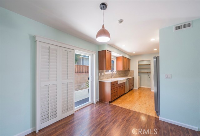 The Dining Area off of the Kitchen with Patio Access.