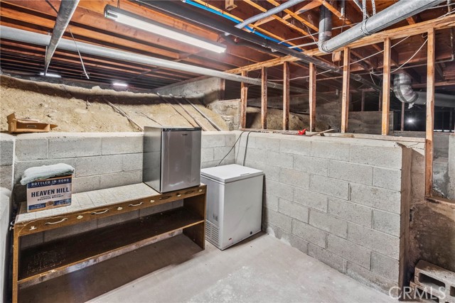 Storage area behind garage.