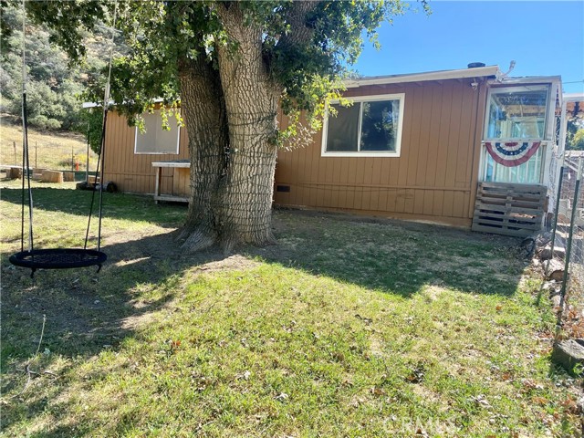 Fenced side yard.