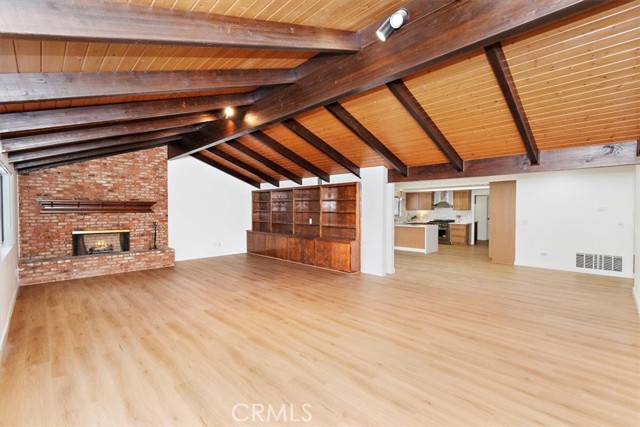 FAMILY ROOM OPENS TO KITCHEN