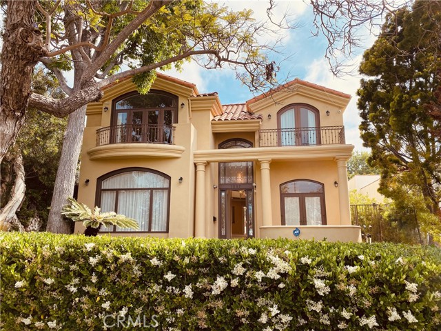 1057 Harvard Street Santa Monica, California Impressive, spacious custom-built Mediterranean villa, located in the desirable North of Wilshire neighborhood in the coveted Franklin Elementary School District, offers grand luxury on university streets. The grand foyer welcomes you with open cathedral ceiling, dazzling crystal chandeliers and stunning wrought iron spiral staircase A modern open floor plan that boasts a large formal living room and an elegant super-sized dining room A great family room that opens to the backyard is just off the gourmet kitchen that hosts granite counters, stainless steel appliances, custom cabinets, and a mini bar for entertaining. This luxurious home features 4bdrm, 5.5 bath plus library/office Main floor office with its own full bath can be used as additional 5th bedroom Upstairs there are 4 bedrooms suites all w/ their own private bathrooms and balcony overlooking a magnificent view. The spacious master suite is a resort, featuring a charming sitting area, vaulted ceilings, a custom fireplace, luxurious master bath and view Relax in your private backyard oasis surrounded by lush landscaping and mature fruit trees walking distance to Bristol Farms and many restaurants. A short drive takes you to the beach, 3rd street shopping or Brentwood Country Club