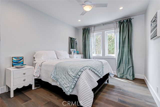 Guest bedroom on the first floor is quietly tucked away for restful slumber.