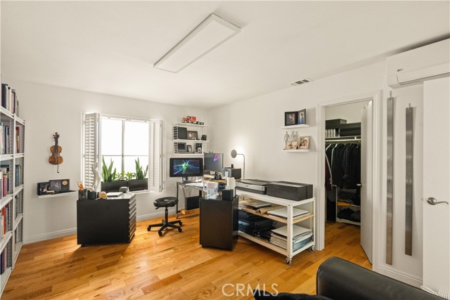 bedroom with walk-in closet