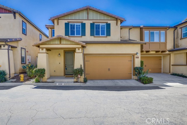 Welcome to 2332 Navigation Circle in the city of Placentia! Located in the Compass Walk community, constructed in 2014, featuring a turn-key residence comprised of 3 well-appointed bedrooms and 2.5 baths. This stunning home offers an open floorplan concept, 1,822 of gross living sq ft, plantation shutters throughout, recessed lighting, luxyury vinyl plank flooring on the main level, carpet on the second level and two-car direct access garge with overhead storage. Kitchen is equipped with modern cabinet finishes, Ceasarstone kitchen countertops and stainless steel appliances.  Additional features include solar panels, owned outright, tankless water heater and Puronics water filtration system. Dedicated laundry room is located on the second level. Prime location with several local eateries, cafes, shopping, parks and golf courses nearby. Make an appointment to view today!