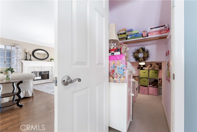 Custom built-in playhouse under the stairwell. Such a delightful surprise and fun space!