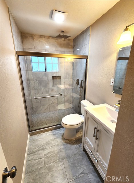 Rebuilt guest bathroom with walk-in shower.