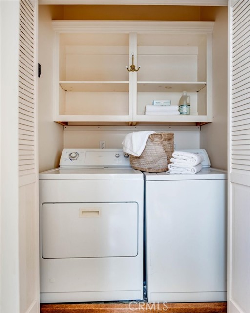 Laundry area adjacent to kitchen.