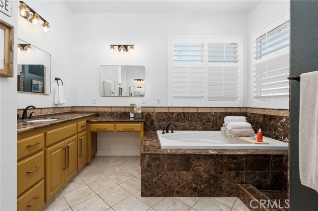 Jetted tub, double sinks and vanity area